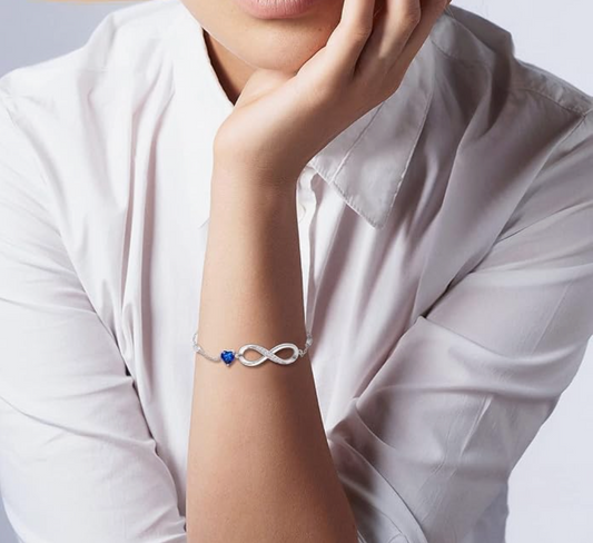 Silver Infinity Loop and Sapphire Blue Heart Charm Bracelet